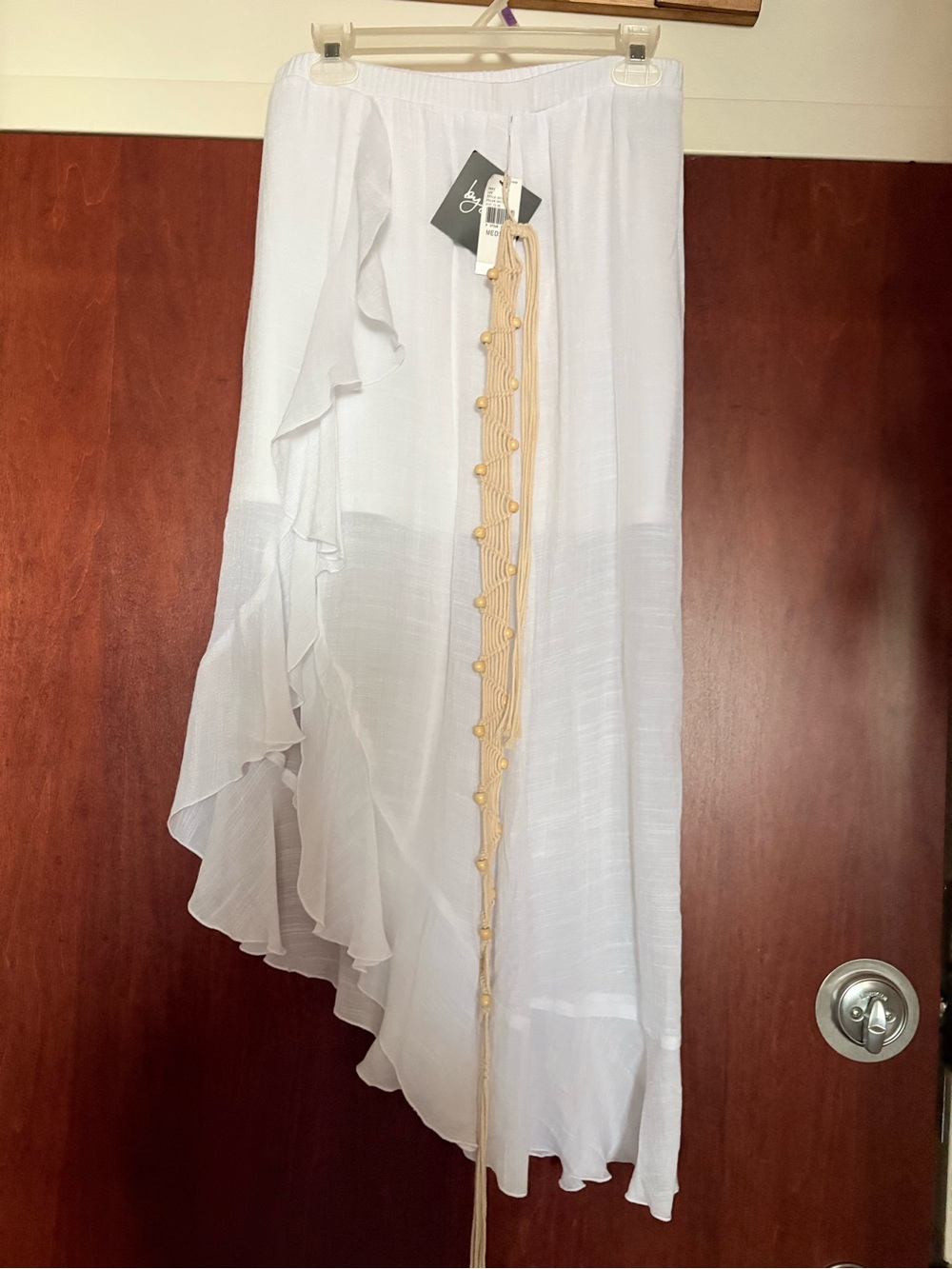 Boho Asymmetric White Ruffle Skirt with Tassel Detail
